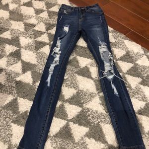 Destressed skinny jeans